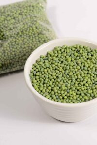 Bag of controlled release fertiliser with visible green granules.