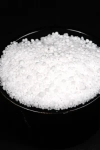 Close-up of Calcium Nitrate granules – essential plant nutrient.