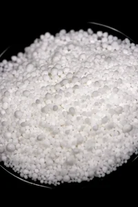 Calcium Nitrate being mixed into water for buffering coco peat.