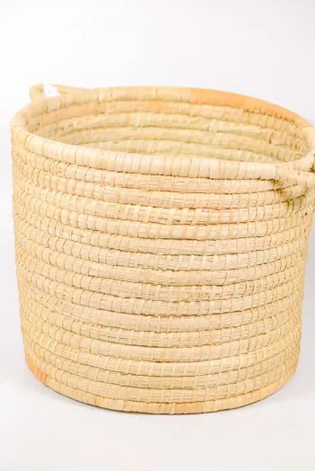 XL handwoven basket made from thick palm fronds with strong rope-like rows.