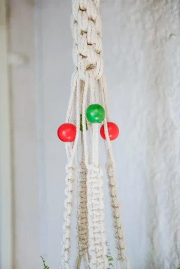 Side angle showing thick cotton cords and bead finish.