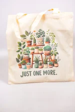 Close-up of printed plant illustrations on cotton fabric.