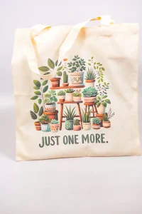 Close-up of printed plant illustrations on cotton fabric.