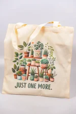 Front view of plant-themed tote bag laid flat.