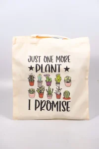 Back view of tote bag with “Just One More Plant I Promise” design.