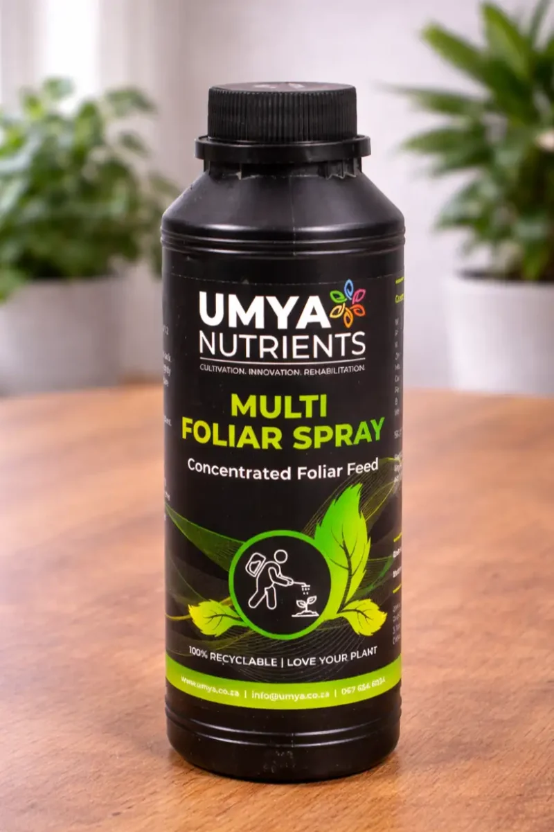 Umya Multi Folian Spray LS Black bottle of Umya Multi Foliar Spray on a wooden table